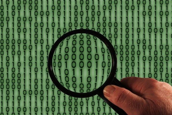 Binary data, magnifying glass